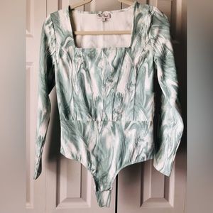 Style not Size Bodysuit.  Size M.  New.